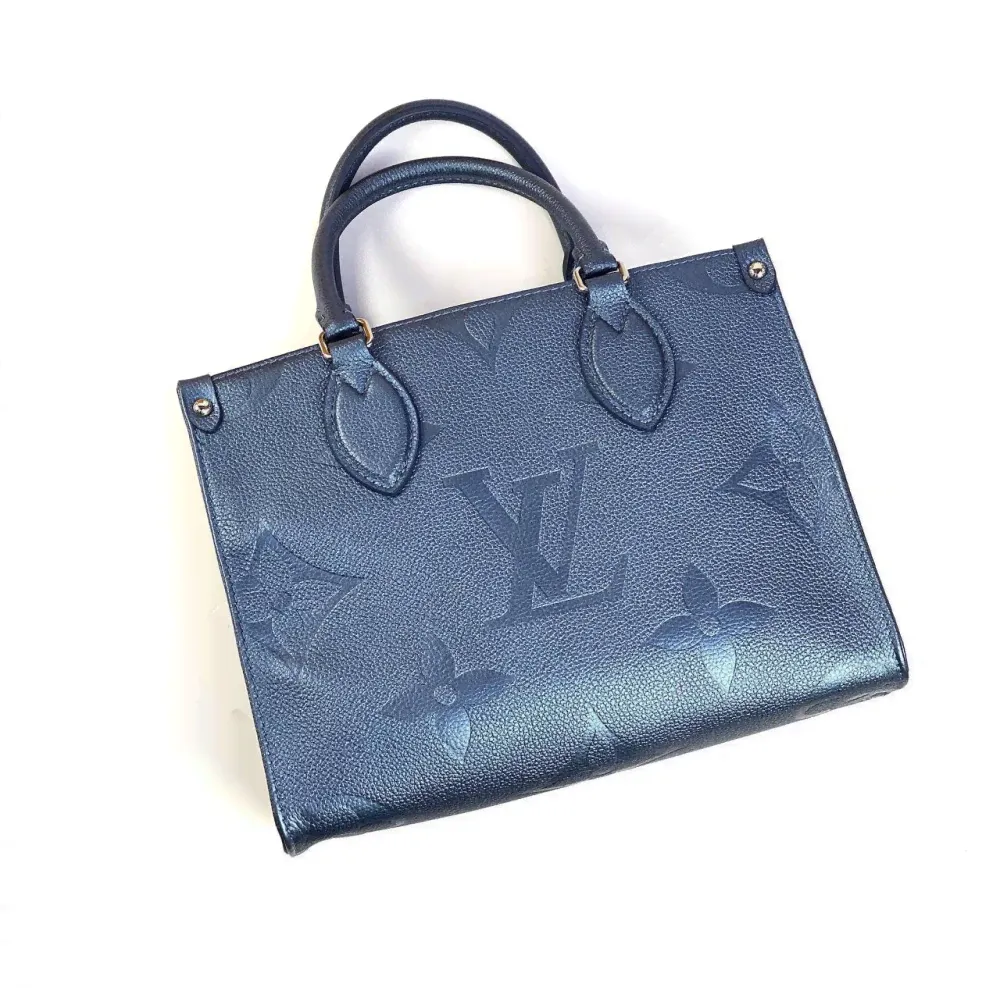 СУМКА LOUIS VUITTON ONTHEGO PM M58956-0